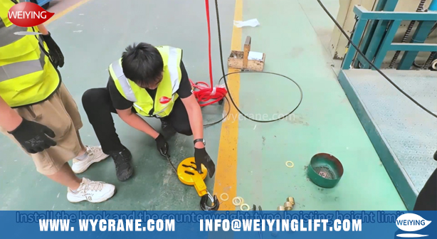 Installing wire rope on double trolley electric hoist drum